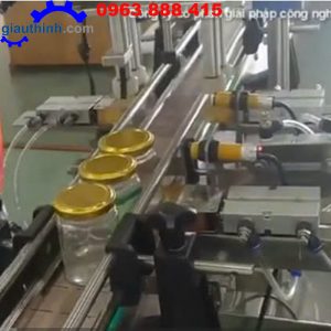 Máy đóng nắp chai