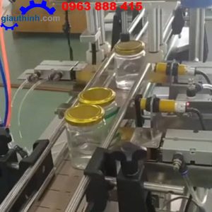 Máy siết nắp chai