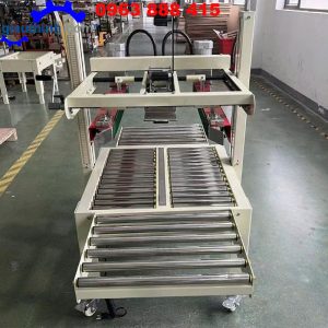 Máy dán băng keo thùng carton