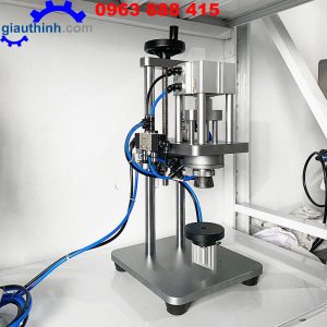 Máy đóng nắp chai xịt khoáng