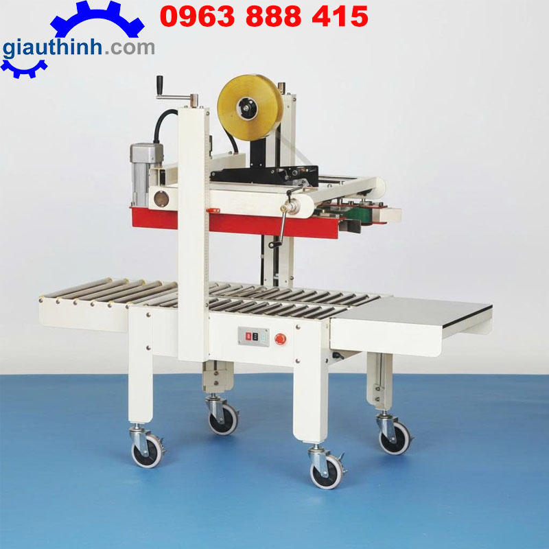 may-dan-bang-dinh-thung-carton Máy dán băng dính thùng carton