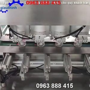 Máy siết nắp chai