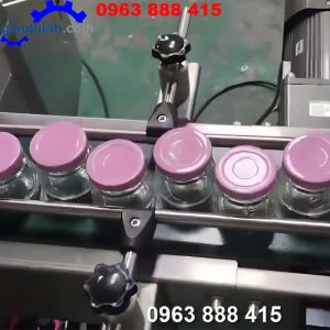 Máy vặn nắp chai