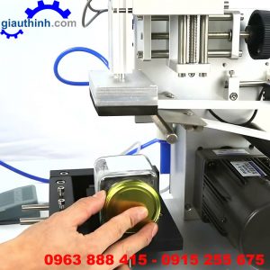 Máy dán nhãn chai dẹp