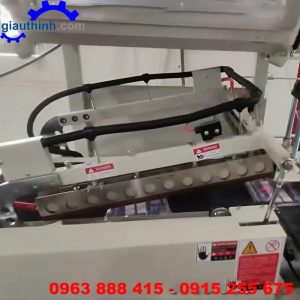 Máy bọc màng co chai lọ