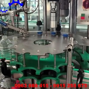 Máy chiết rót vặn nắp chai