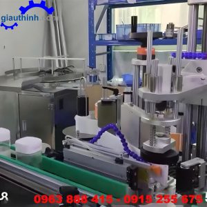 Máy dán tem nhãn chai lọ