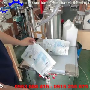 Máy chiết rót nước xả vải